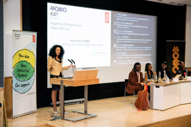 Kanye King speaking at an "Inspiring Entrepreneurs" event in the British Library.