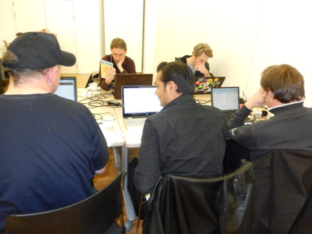 Group hard at work on the day. Public domain dedication