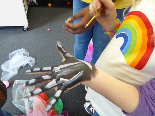 Body painting in Brixton library. Photo credit: Julia Chandler/Libraries Taskforce