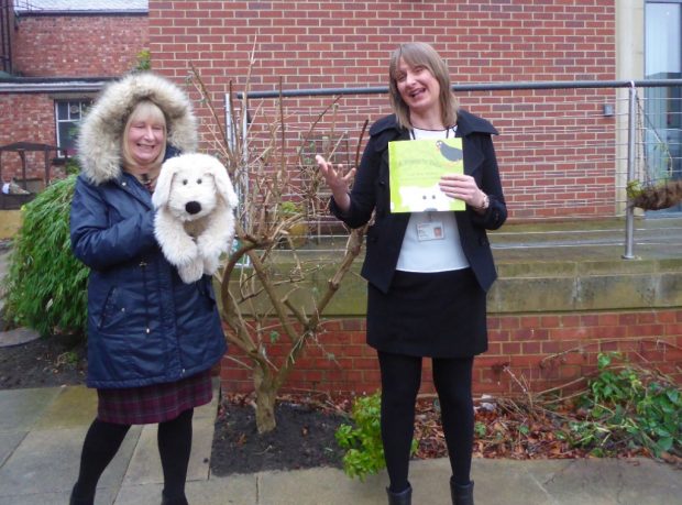 Walking with a puppy in Gateshead library garden