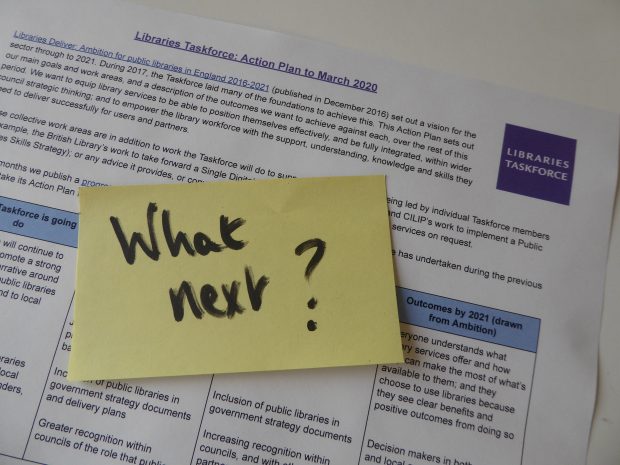 Photo of a post it note saying what next? on the Taskforce action plan