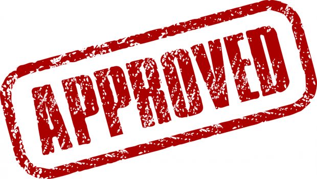 Graphic of a stamp saying approved