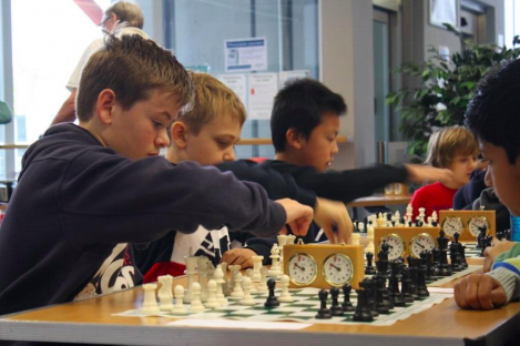 Photo of a boys playing chess