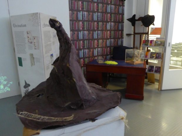 Photo of a sorting hat in a corner of the exhibition in Leeds central library