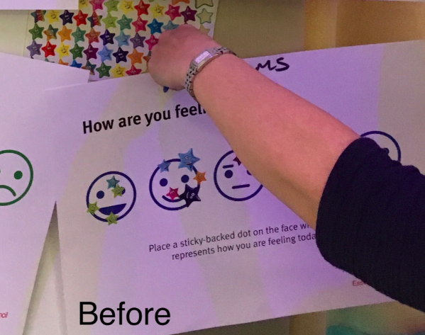 Photo of a mood chart used for measuring the impact of modified rhyme times. Photo credit: Ben Lee