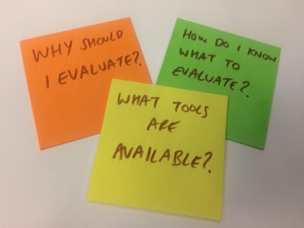 A photo of 3 post it notes which say: why should I evaluate? how do I evaluate? what tools are available?