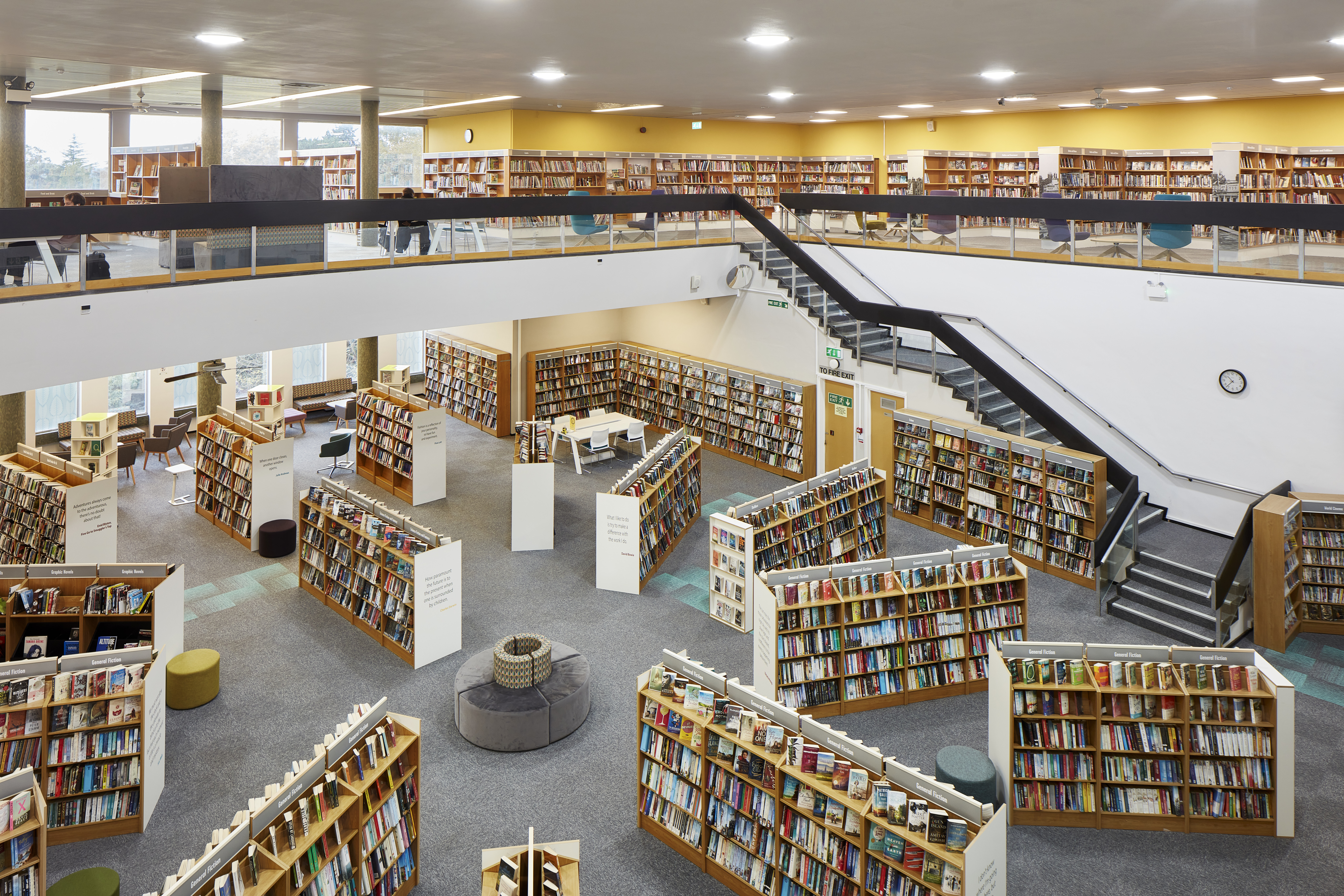 Internal shot of Bromley Library looking down at bookshelves from the first floor